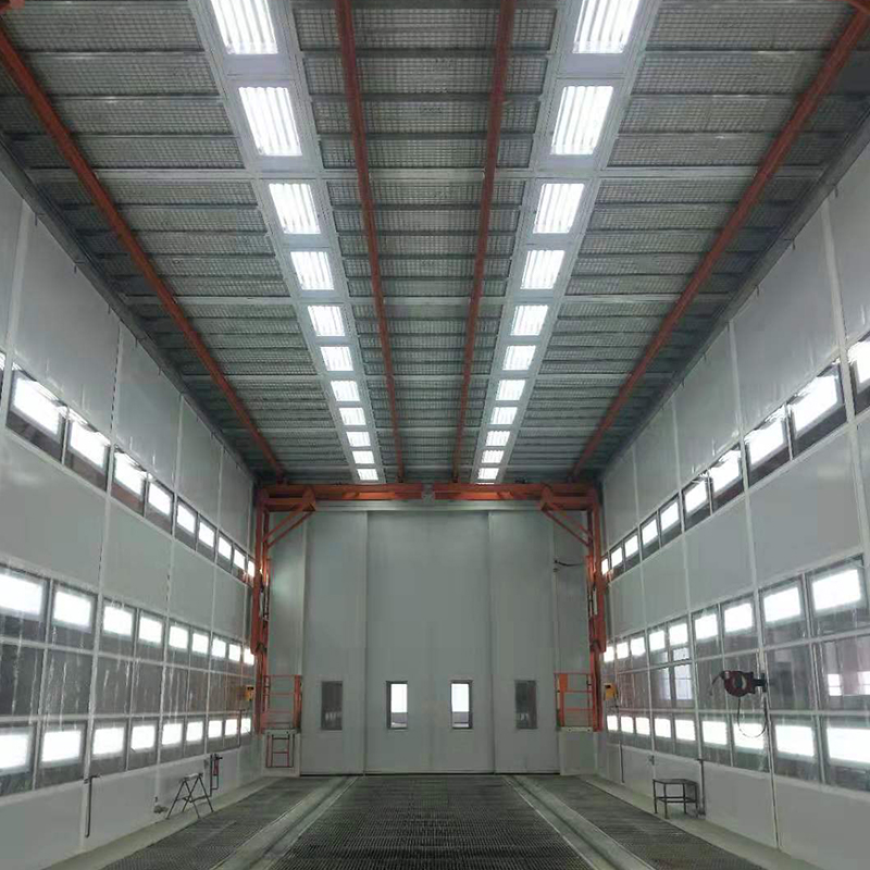 Cabine de pulvérisation pour véhicules lourds