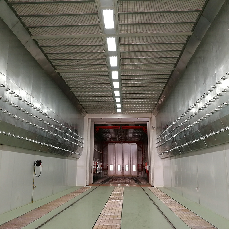 Cabine de pulvérisation pour véhicules lourds